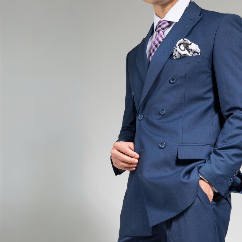 *model wearing our premium blue double-breasted suit