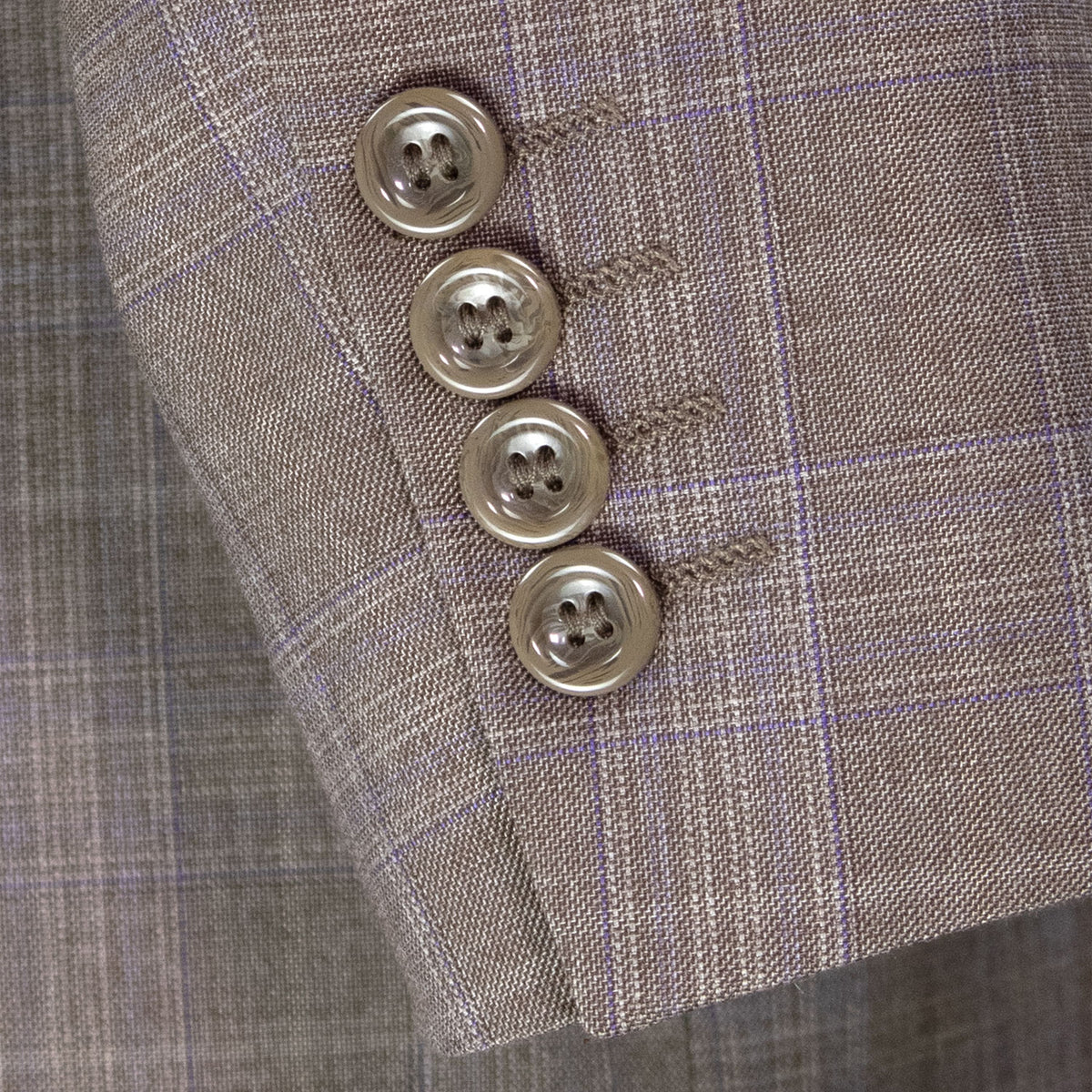 VINCI Men's Tan Glen Plaid Double-Breasted Regular Fit Suit with Adjustable Waist - NEW. Features a sharp peak lapel jacket and flat-front pants with unfinished hems and flexible waistband. A timeless choice for business or formal wear. Available at Fashion House Inc. (FH Menswear)
