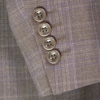 VINCI Men's Tan Glen Plaid Double-Breasted Regular Fit Suit with Adjustable Waist - NEW. Features a sharp peak lapel jacket and flat-front pants with unfinished hems and flexible waistband. A timeless choice for business or formal wear. Available at Fashion House Inc. (FH Menswear)