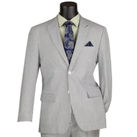 VINCI Men's Green Striped Seersucker 2-Button Modern Fit Cotton Suit - NEW. Contemporary trim fit with a breathable cotton fabric, fully lined jacket with notch lapel, and non-pleated trousers ready for custom tailoring. Ideal for both professional and social settings. Available at Fashion House Inc. (FH Menswear)
