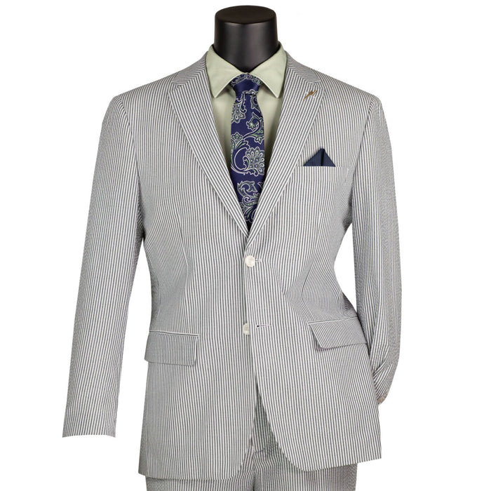 VINCI Men's Green Striped Seersucker 2-Button Modern Fit Cotton Suit - NEW. Contemporary trim fit with a breathable cotton fabric, fully lined jacket with notch lapel, and non-pleated trousers ready for custom tailoring. Ideal for both professional and social settings. Available at Fashion House Inc. (FH Menswear)