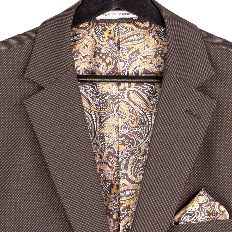 VINCI Men's Brown 3pc Super Stretch Modern Fit Suit with Adjustable Waist – Machine Washable – NEW. Features a sleek notch lapel jacket, flat-front pants, and flexible, washable fabric. Ideal for versatile, everyday elegance. Available at Fashion House Inc. (FH Menswear)