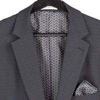 VINCI Men's Charcoal Black 3pc Super Stretch Modern Fit Suit with Adjustable Waist – Machine Washable – NEW. Features a sleek notch lapel jacket, flat-front pants, and flexible, washable fabric. Ideal for versatile, everyday elegance. Available at Fashion House Inc. (FH Menswear)