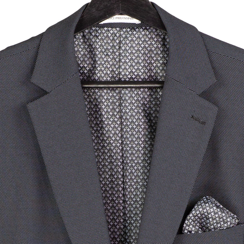 VINCI Men's Charcoal Black 3pc Super Stretch Modern Fit Suit with Adjustable Waist – Machine Washable – NEW. Features a sleek notch lapel jacket, flat-front pants, and flexible, washable fabric. Ideal for versatile, everyday elegance. Available at Fashion House Inc. (FH Menswear)