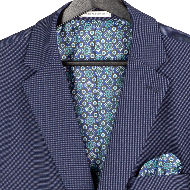 VINCI Men's Navy Blue 3pc Super Stretch Modern Fit Suit with Adjustable Waist – Machine Washable – NEW. Features a sleek notch lapel jacket, flat-front pants, and flexible, washable fabric. Ideal for versatile, everyday elegance. Available at Fashion House Inc. (FH Menswear)