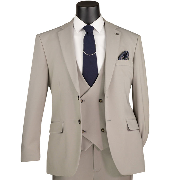 VINCI Men's Tan 3pc Super Stretch Modern Fit Suit with Adjustable Waist – Machine Washable – NEW. Features a sleek notch lapel jacket, flat-front pants, and flexible, washable fabric. Ideal for versatile, everyday elegance. Available at Fashion House Inc. (FH Menswear)