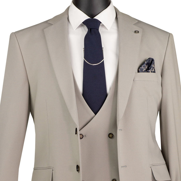 VINCI Men's Tan 3pc Super Stretch Modern Fit Suit with Adjustable Waist – Machine Washable – NEW. Features a sleek notch lapel jacket, flat-front pants, and flexible, washable fabric. Ideal for versatile, everyday elegance. Available at Fashion House Inc. (FH Menswear)