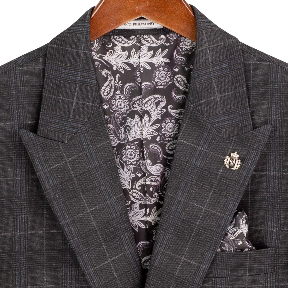 VINCI Men's Black Plaid Stretch 3 Piece Slim Fit 1 Button Suit – NEW. Features a bold peak lapel jacket with one-button closure, low cut vest, and flat-front pants with unfinished hems for custom tailoring. A modern, stylish choice for office or evening wear. Available at Fashion House Inc. (FH Menswear, Style #SV1W-1)