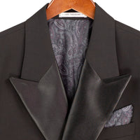 VINCI Men's Black Double Breasted Regular Fit Tuxedo with Flexible Waistband NEW. Features an oversized wide sateen peak lapel, premium fancy lining, built in pocket square, and flat front pants with flexible comfort waistband, sateen side stripe, and unfinished hems for custom tailoring. Includes a matching bow tie. A classic men's Black tuxedo for weddings, proms, galas, black tie events, and formal occasions. Available at Fashion House Inc. (FH Menswear, Style #TDB-900)