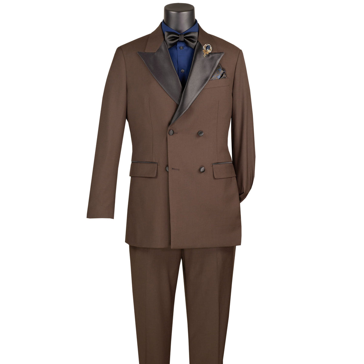 VINCI Men's Brown Double Breasted Regular Fit Tuxedo with Flexible Waistband NEW. Features an oversized wide sateen peak lapel, premium fancy lining, built in pocket square, and flat front pants with flexible comfort waistband, sateen side stripe, and unfinished hems for custom tailoring. Includes a matching bow tie. A classic men's Brown tuxedo for weddings, proms, galas, black tie events, and formal occasions. Available at Fashion House Inc. (FH Menswear, Style #TDB-900)