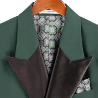 VINCI Men's Hunter Green Double Breasted Regular Fit Tuxedo with Flexible Waistband NEW. Features an oversized wide sateen peak lapel, premium fancy lining, built in pocket square, and flat front pants with flexible comfort waistband, sateen side stripe, and unfinished hems for custom tailoring. Includes a matching bow tie. A classic men's Hunter Green tuxedo for weddings, proms, galas, black tie events, and formal occasions. Available at Fashion House Inc. (FH Menswear, Style #TDB-900)