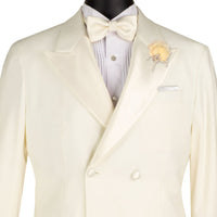VINCI Men's Ivory Double Breasted Regular Fit Tuxedo with Flexible Waistband NEW. Features an oversized wide sateen peak lapel, premium fancy lining, built in pocket square, and flat front pants with flexible comfort waistband, sateen side stripe, and unfinished hems for custom tailoring. Includes a matching bow tie. A classic men's Ivory tuxedo for weddings, proms, galas, black tie events, and formal occasions. Available at Fashion House Inc. (FH Menswear, Style #TDB-900)