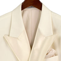VINCI Men's Ivory Double Breasted Regular Fit Tuxedo with Flexible Waistband NEW. Features an oversized wide sateen peak lapel, premium fancy lining, built in pocket square, and flat front pants with flexible comfort waistband, sateen side stripe, and unfinished hems for custom tailoring. Includes a matching bow tie. A classic men's Ivory tuxedo for weddings, proms, galas, black tie events, and formal occasions. Available at Fashion House Inc. (FH Menswear, Style #TDB-900)