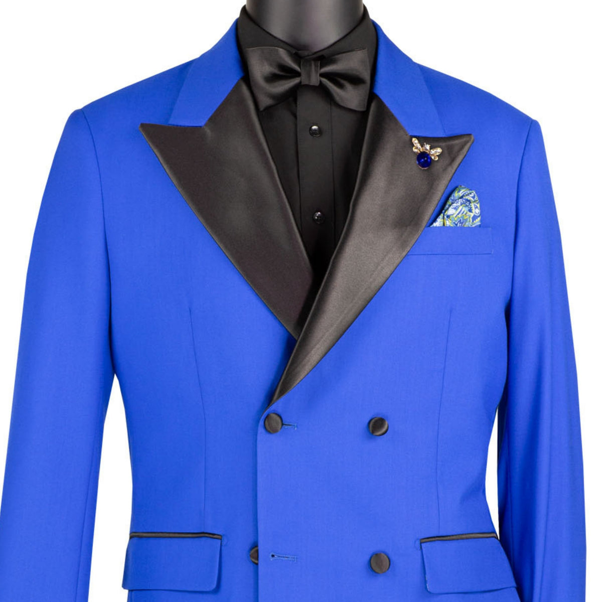 VINCI Men's Royal Blue Double Breasted Regular Fit Tuxedo with Flexible Waistband NEW. Features an oversized wide sateen peak lapel, premium fancy lining, built in pocket square, and flat front pants with flexible comfort waistband, sateen side stripe, and unfinished hems for custom tailoring. Includes a matching bow tie. A classic men's Royal Blue tuxedo for weddings, proms, galas, black tie events, and formal occasions. Available at Fashion House Inc. (FH Menswear, Style #TDB-900)
