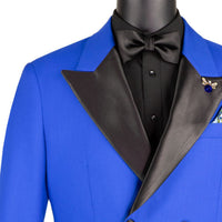 VINCI Men's Royal Blue Double Breasted Regular Fit Tuxedo with Flexible Waistband NEW. Features an oversized wide sateen peak lapel, premium fancy lining, built in pocket square, and flat front pants with flexible comfort waistband, sateen side stripe, and unfinished hems for custom tailoring. Includes a matching bow tie. A classic men's Royal Blue tuxedo for weddings, proms, galas, black tie events, and formal occasions. Available at Fashion House Inc. (FH Menswear, Style #TDB-900)