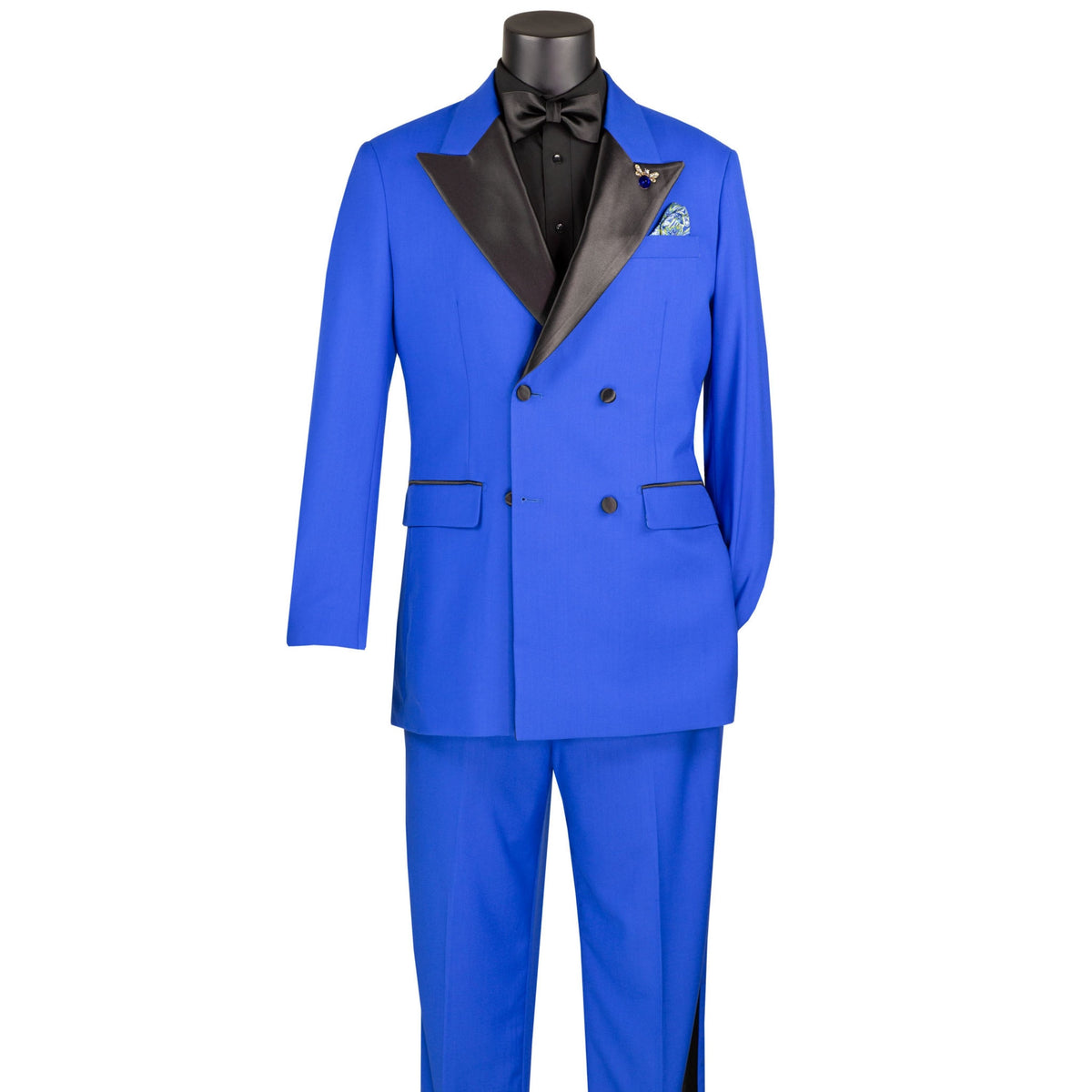 VINCI Men's Royal Blue Double Breasted Regular Fit Tuxedo with Flexible Waistband NEW. Features an oversized wide sateen peak lapel, premium fancy lining, built in pocket square, and flat front pants with flexible comfort waistband, sateen side stripe, and unfinished hems for custom tailoring. Includes a matching bow tie. A classic men's Royal Blue tuxedo for weddings, proms, galas, black tie events, and formal occasions. Available at Fashion House Inc. (FH Menswear, Style #TDB-900)