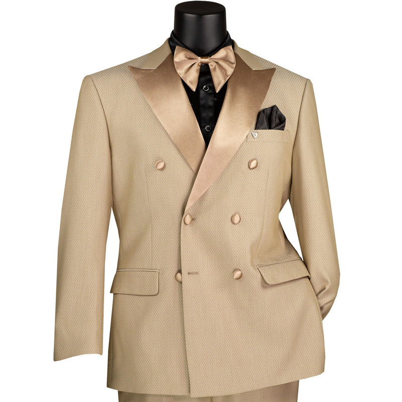 VINCI Men's Beige Double-Breasted Modern Fit Tuxedo with Sateen Trim and Adjustable Waist – NEW. Features an oversized sateen peak lapel, fully lined jacket, flat-front pants with flexible waistband, and unfinished hems for custom tailoring. A bold, elegant choice for black-tie events. Available at Fashion House Inc. (FH Menswear, Style #TMDB-1)