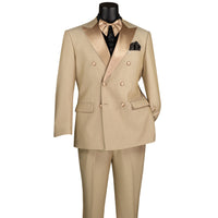 VINCI Men's Beige Double-Breasted Modern Fit Tuxedo with Sateen Trim and Adjustable Waist – NEW. Features an oversized sateen peak lapel, fully lined jacket, flat-front pants with flexible waistband, and unfinished hems for custom tailoring. A bold, elegant choice for black-tie events. Available at Fashion House Inc. (FH Menswear, Style #TMDB-1)