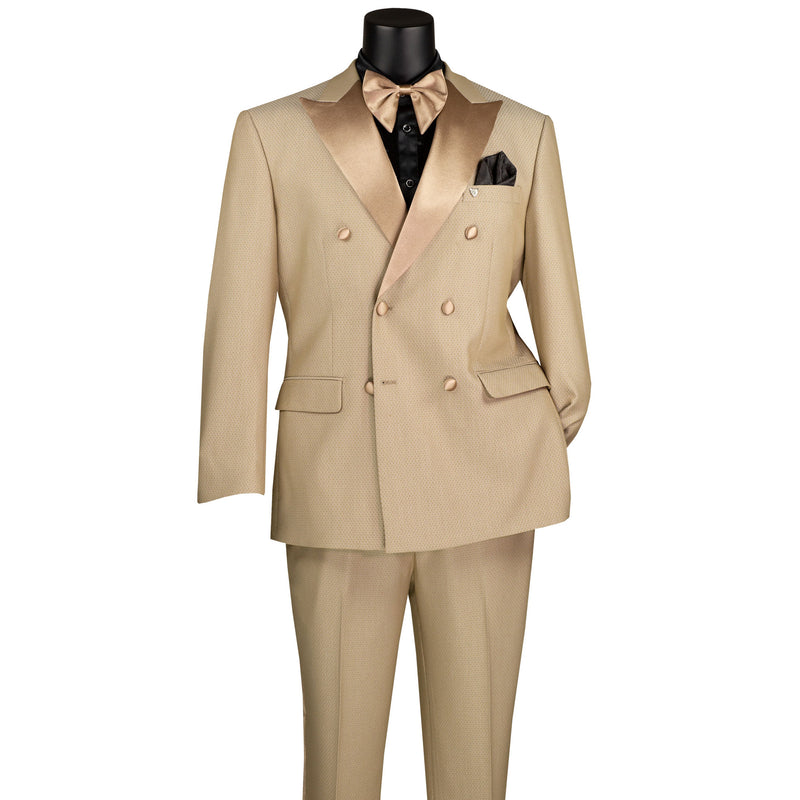 VINCI Men's Beige Double-Breasted Modern Fit Tuxedo with Sateen Trim and Adjustable Waist – NEW. Features an oversized sateen peak lapel, fully lined jacket, flat-front pants with flexible waistband, and unfinished hems for custom tailoring. A bold, elegant choice for black-tie events. Available at Fashion House Inc. (FH Menswear, Style #TMDB-1)