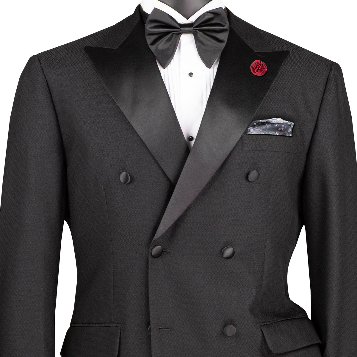 VINCI Men's Black Double-Breasted Modern Fit Tuxedo with Sateen Trim and Adjustable Waist – NEW. Features an oversized sateen peak lapel, fully lined jacket, flat-front pants with flexible waistband, and unfinished hems for custom tailoring. A bold, elegant choice for black-tie events. Available at Fashion House Inc. (FH Menswear, Style #TMDB-1)