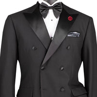 VINCI Men's Black Double-Breasted Modern Fit Tuxedo with Sateen Trim and Adjustable Waist – NEW. Features an oversized sateen peak lapel, fully lined jacket, flat-front pants with flexible waistband, and unfinished hems for custom tailoring. A bold, elegant choice for black-tie events. Available at Fashion House Inc. (FH Menswear, Style #TMDB-1)