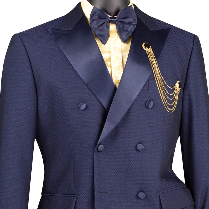 VINCI Men's Navy Blue Double-Breasted Modern Fit Tuxedo with Sateen Trim and Adjustable Waist – NEW. Features an oversized sateen peak lapel, fully lined jacket, flat-front pants with flexible waistband, and unfinished hems for custom tailoring. A bold, elegant choice for black-tie events. Available at Fashion House Inc. (FH Menswear, Style #TMDB-1)