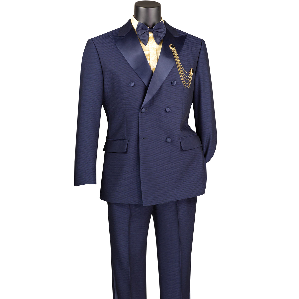 VINCI Men's Navy Blue Double-Breasted Modern Fit Tuxedo with Sateen Trim and Adjustable Waist – NEW. Features an oversized sateen peak lapel, fully lined jacket, flat-front pants with flexible waistband, and unfinished hems for custom tailoring. A bold, elegant choice for black-tie events. Available at Fashion House Inc. (FH Menswear, Style #TMDB-1)