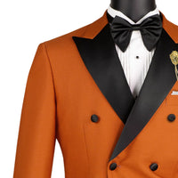 VINCI Men's Rust Brown Double Breasted Modern Fit Tuxedo with Sateen Trim & Flexible Waistband NEW. Features an oversized sateen peak lapel, fully lined jacket, flat front pants with a flexible comfort waistband, and unfinished hems for custom tailoring. A bold, elegant choice for black tie events. Available at Fashion House Inc. (FH Menswear, Style #TMDB-1)
