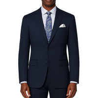 VINCI Men's Navy Blue 2-Button Suit with Adjustable Waistband, Regular-Fit - NEW. Features a notch lapel jacket luxuriously lined for comfort and non-pleated trousers designed for a custom fit. Ideal for both office and elegant evening wear. Available at Fashion House Inc. (FH Menswear)
