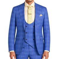 VINCI Men's Blue Plaid Stretch 3 Piece Slim Fit 1 Button Suit – NEW. Features a bold peak lapel jacket with one-button closure, low cut vest, and flat-front pants with unfinished hems for custom tailoring. A modern, stylish choice for office or evening wear. Available at Fashion House Inc. (FH Menswear, Style #SV1W-1)
