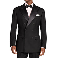 VINCI Men's Black Double Breasted Regular Fit Tuxedo with Flexible Waistband NEW. Features an oversized wide sateen peak lapel, premium fancy lining, built in pocket square, and flat front pants with flexible comfort waistband, sateen side stripe, and unfinished hems for custom tailoring. Includes a matching bow tie. A classic men's Black tuxedo for weddings, proms, galas, black tie events, and formal occasions. Available at Fashion House Inc. (FH Menswear, Style #TDB-900)