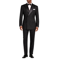 VINCI Men's Black Double Breasted Regular Fit Tuxedo with Flexible Waistband NEW. Features an oversized wide sateen peak lapel, premium fancy lining, built in pocket square, and flat front pants with flexible comfort waistband, sateen side stripe, and unfinished hems for custom tailoring. Includes a matching bow tie. A classic men's Black tuxedo for weddings, proms, galas, black tie events, and formal occasions. Available at Fashion House Inc. (FH Menswear, Style #TDB-900)